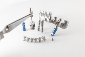 Metal frame for dental implants